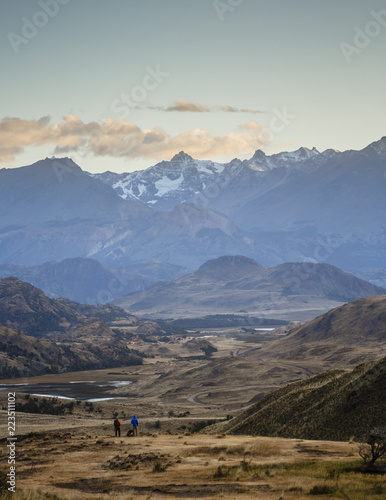 hikers at Chacabuco Valley with a view over the Jeinimeni Mountain peaks, Parque Patagonia, AysŽn Region, Chile.