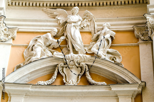 Statues of angels on one of the ancient buildings of Rome. Italy.
 photo