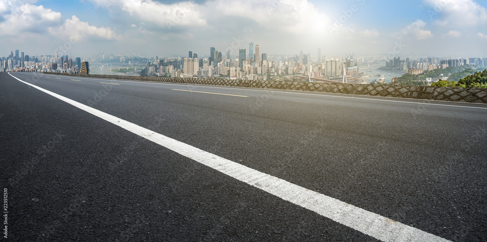 Naklejka premium Road pavement and Chongqing urban architecture skyline