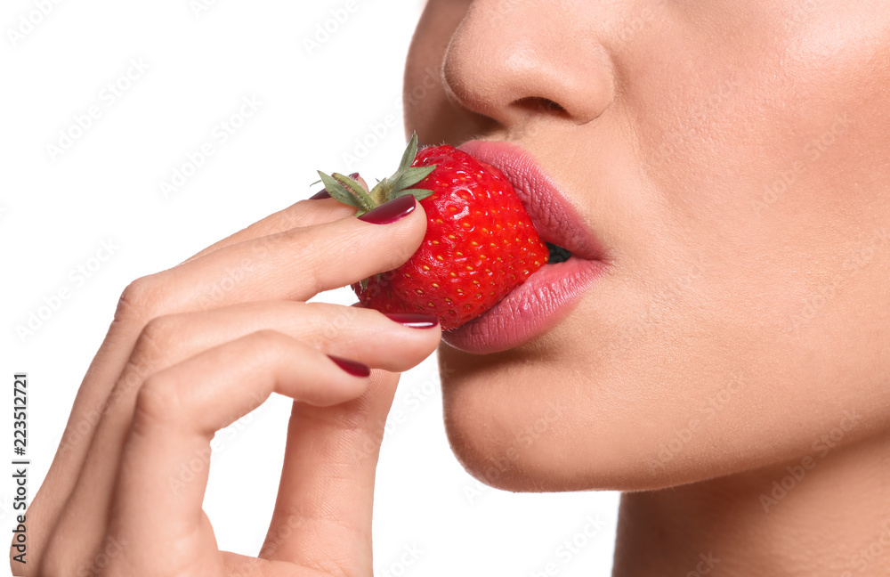 Sexy young woman with strawberry on white background, closeup Sexy young woman with strawberry on white background, closeup