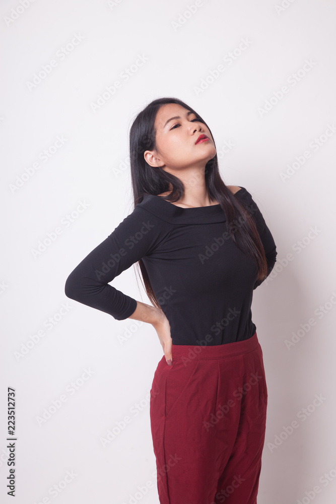 Young Asian woman got back pain. Young Asian woman got back pain.