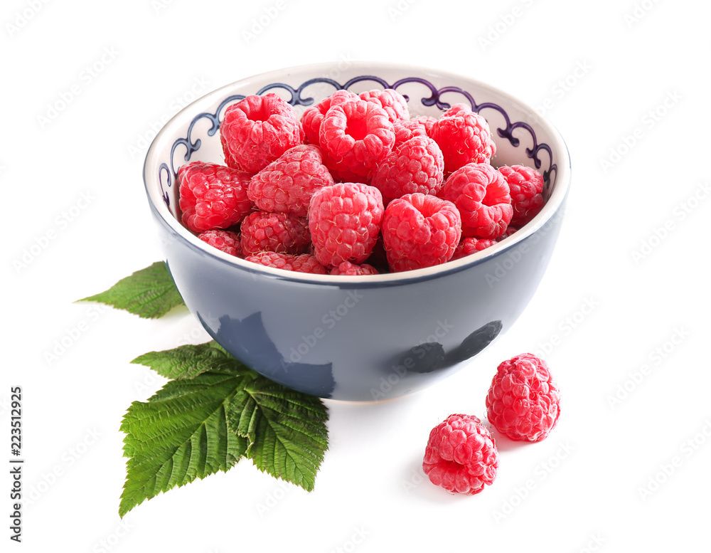Bowl with ripe raspberries on white background Bowl with ripe raspberries on white background