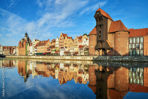 Cityscape of Gdansk with reflection in channel photo