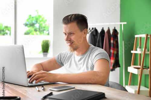 Handsome freelancer working...