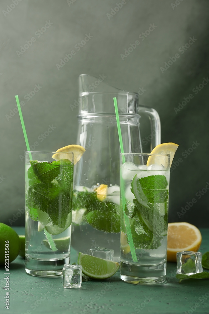 Composition with fresh mojito on green table