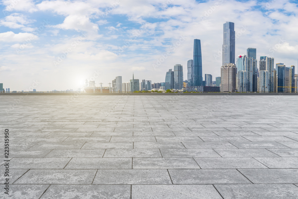 Urban skyscrapers with empty square floor tiles