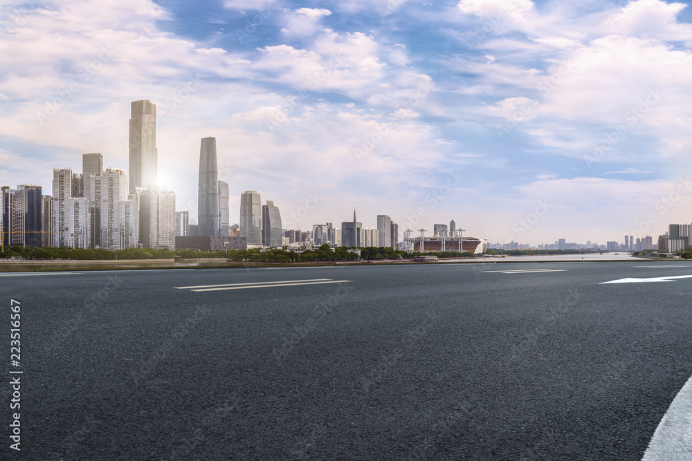 Road pavement and Guangzhou city buildings skyline