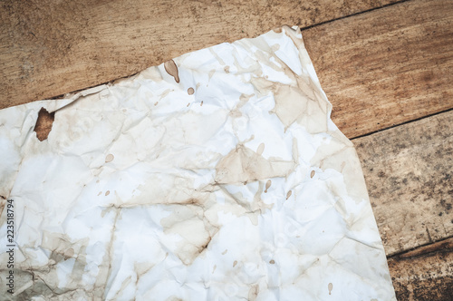 Vintage Crumpled paper texture on wooden table