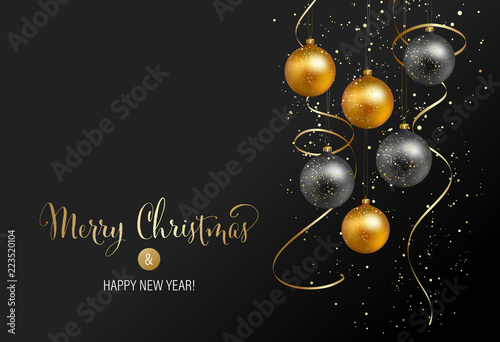 Christmas background with gold baubles and serpentine