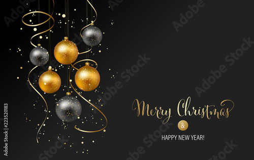 Christmas background with gold baubles and serpentine