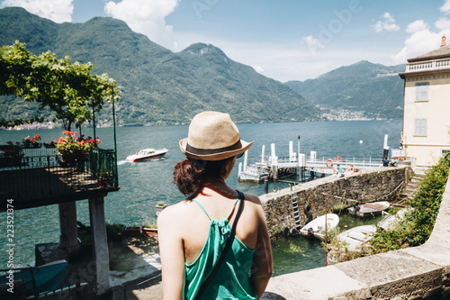 Fototapeta Naklejka Na Ścianę i Meble -  girl looking the lake Como Lake from Nesso, Lombardy, Italy