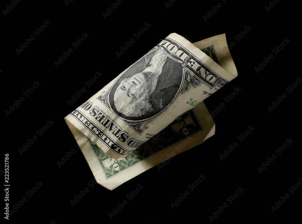 One dollar bill isolated on black background One dollar bill isolated on black background