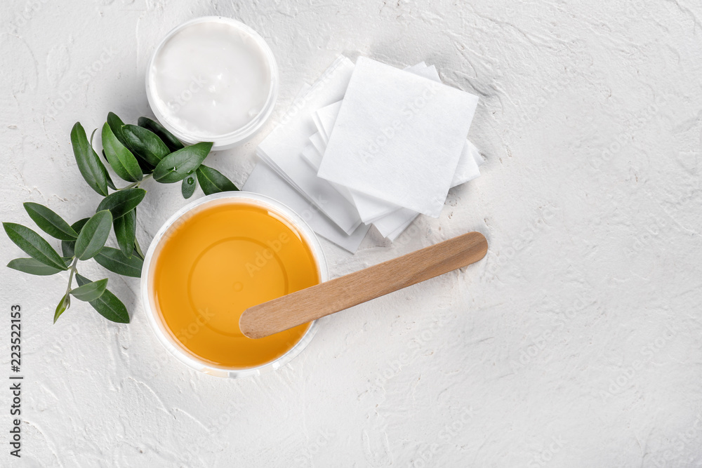 Set for epilation on white textured background Set for epilation on white textured background