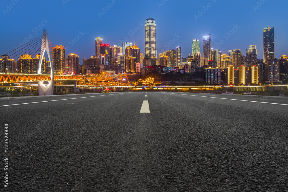 Naklejka premium Road pavement and Chongqing urban architecture skyline