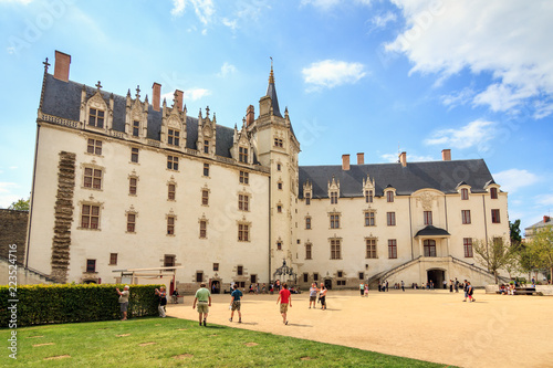 People visiting The Château des ducs de Bretagne (Castle of the Dukes of Brittany) in summer in the city of Nantes, France, on July 29, 2014
 photo