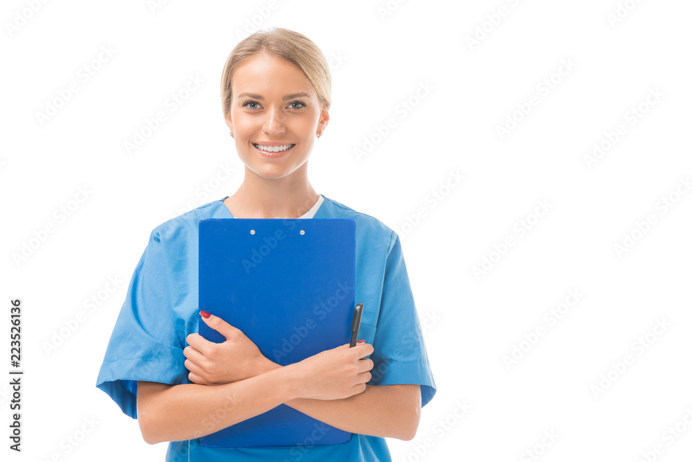 happy young nurse holding clipboard and looking at camera isolated on white happy young nurse holding clipboard and looking at camera isolated on white