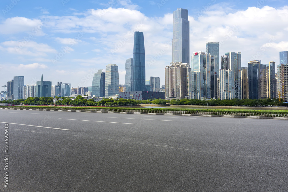 Road pavement and Guangzhou city buildings skyline