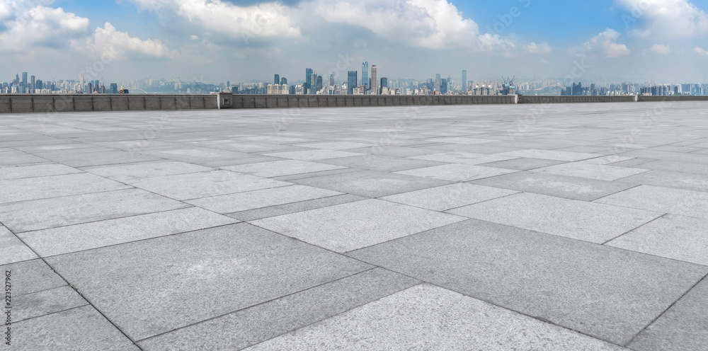 Urban skyscrapers with empty square floor tiles