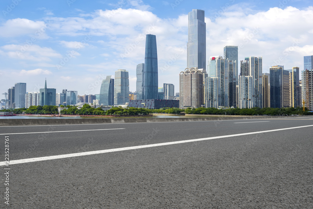 Road pavement and Guangzhou city buildings skyline