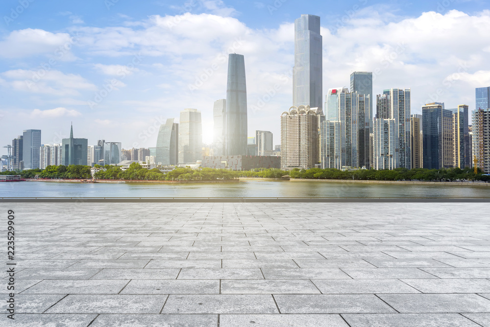 Urban skyscrapers with empty square floor tiles