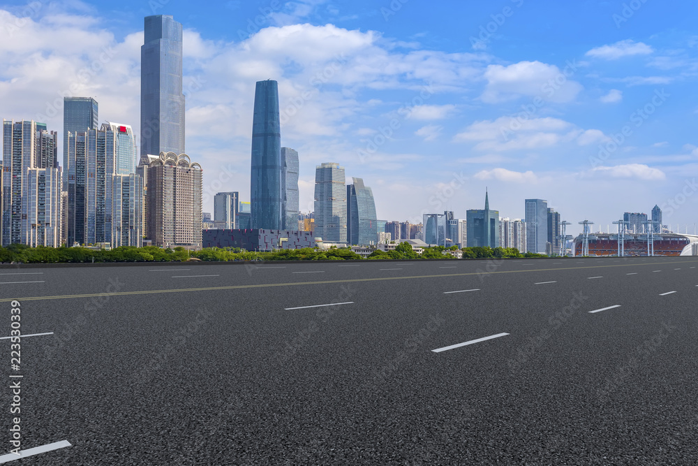 Road pavement and Guangzhou city buildings skyline