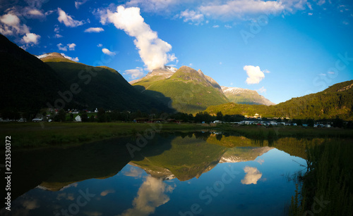 Sunset over Innvikfjorden and Loen village, Stryn, Norway photo