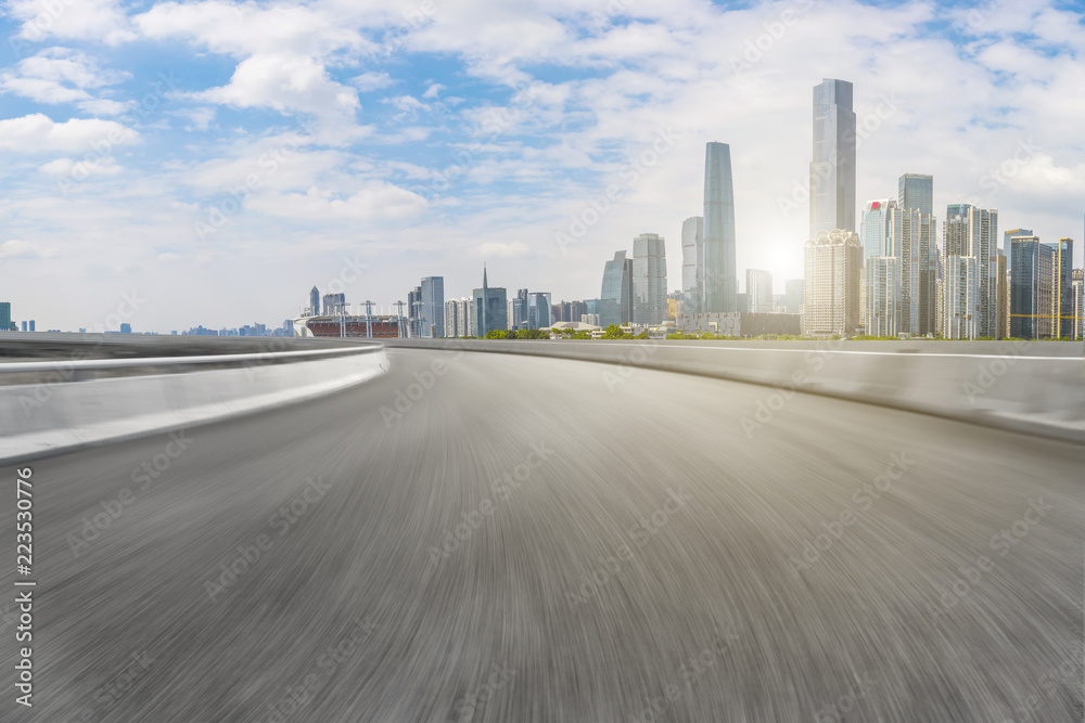 Obraz premium Road pavement and Guangzhou city buildings skyline
