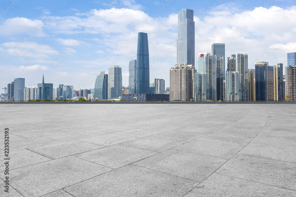 Urban skyscrapers with empty square floor tiles Urban skyscrapers with empty square floor tiles