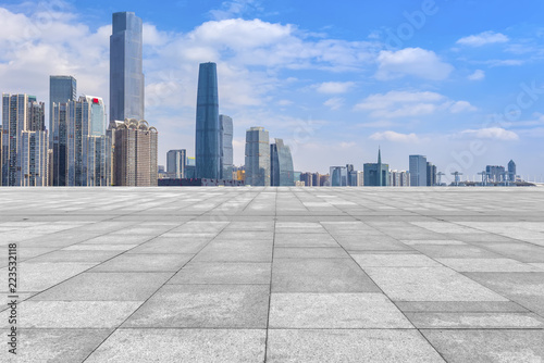 Urban skyscrapers with empty square floor tiles