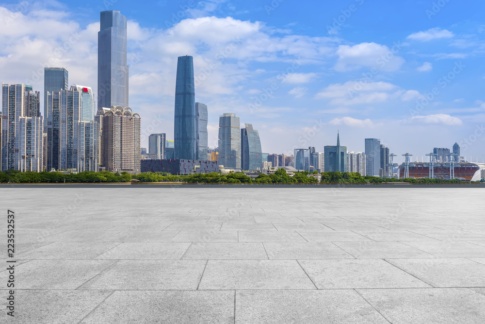 Urban skyscrapers with empty square floor tiles