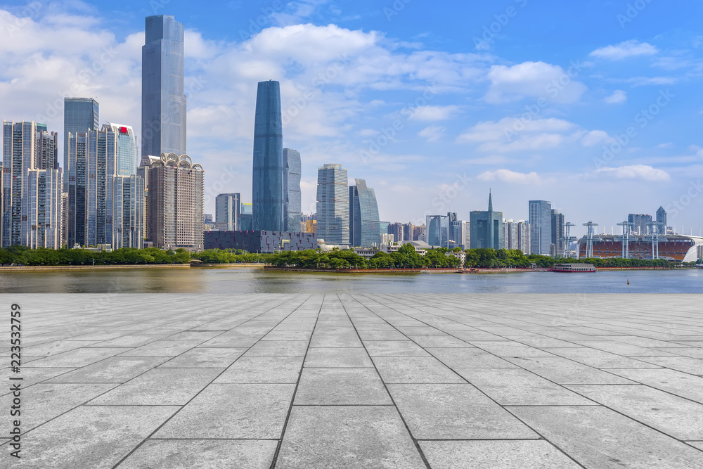 Urban skyscrapers with empty square floor tiles