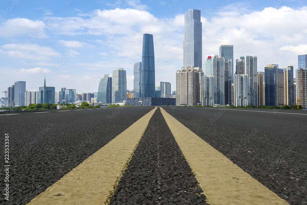 Road pavement and Guangzhou city buildings skyline Road pavement and Guangzhou city buildings skyline