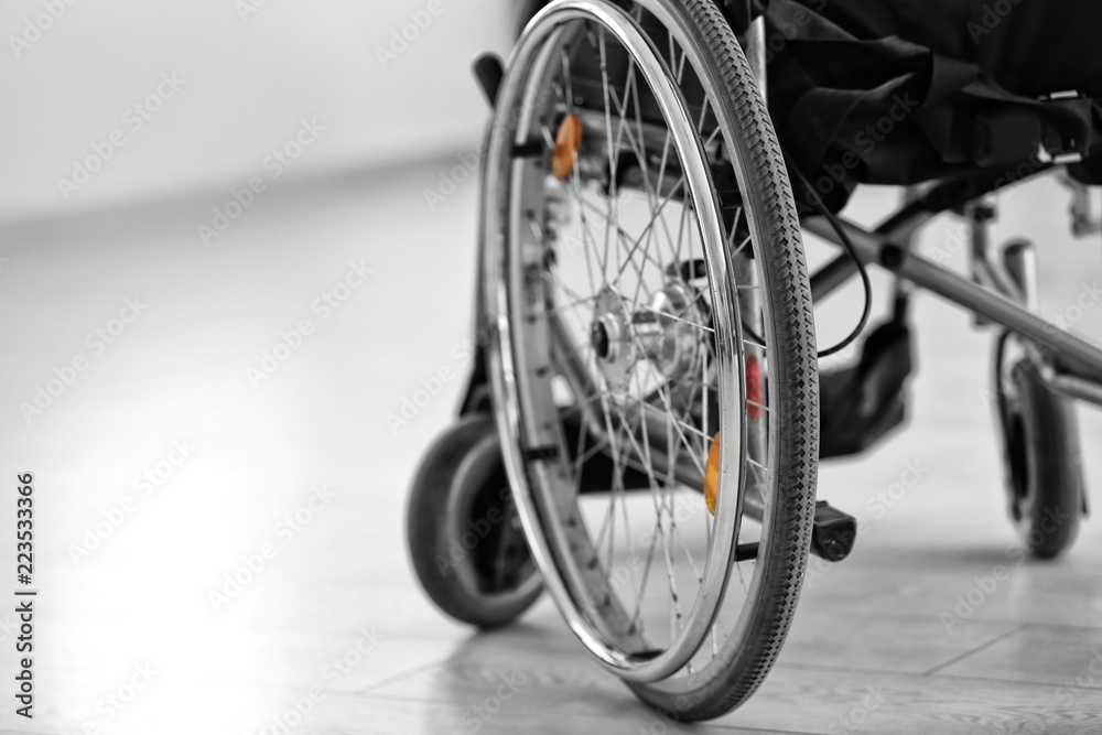 Empty modern wheelchair indoors Empty modern wheelchair indoors