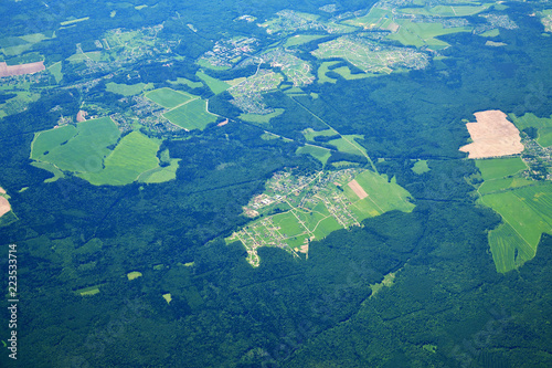 view from height to plain covered with forest