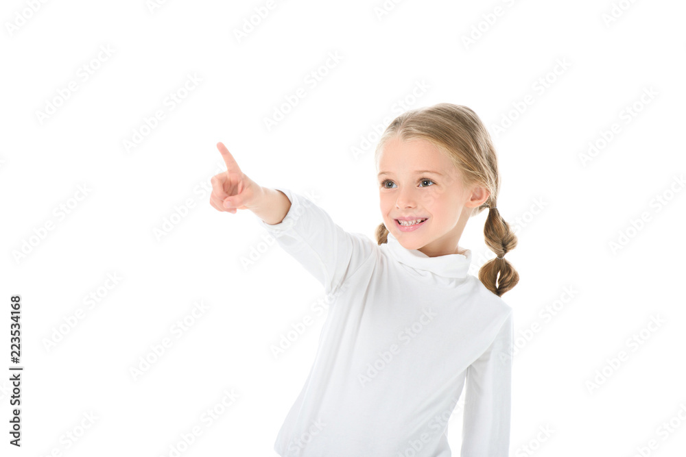 adorable smiling kid with braids showing something, isolated on white adorable smiling kid with braids showing something, isolated on white