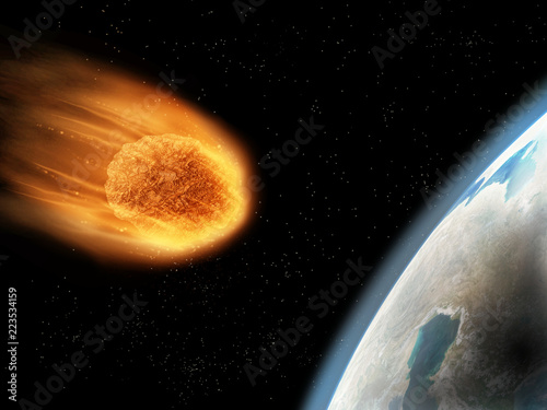 Falling down, pulled by gravity, meteor entering planet earth's atmosphere and its surface start getting burned. Armageddon concept. Elements of this image furnished by NASA