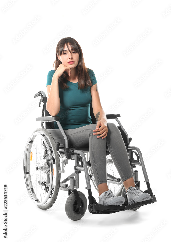 Young woman in wheelchair on white background Young woman in wheelchair on white background