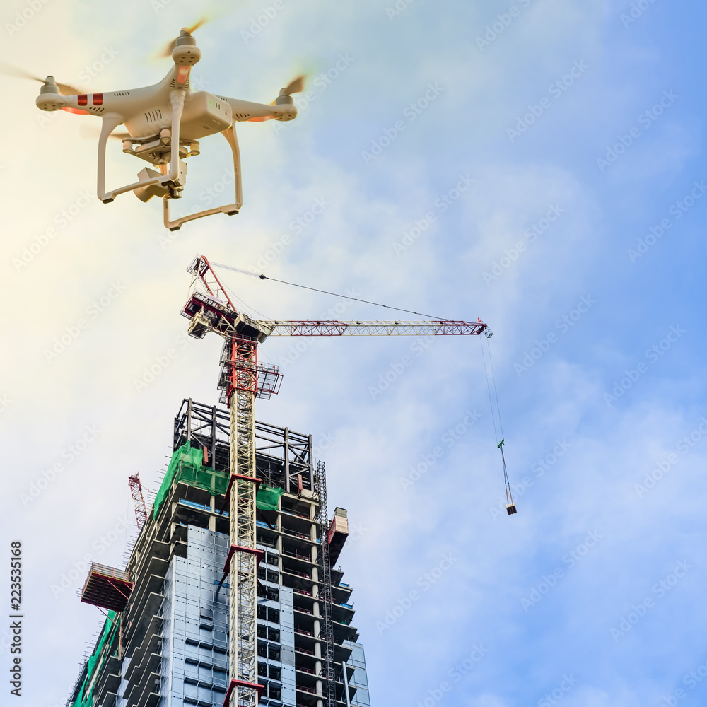 Drone over construction site of modern office and residential building