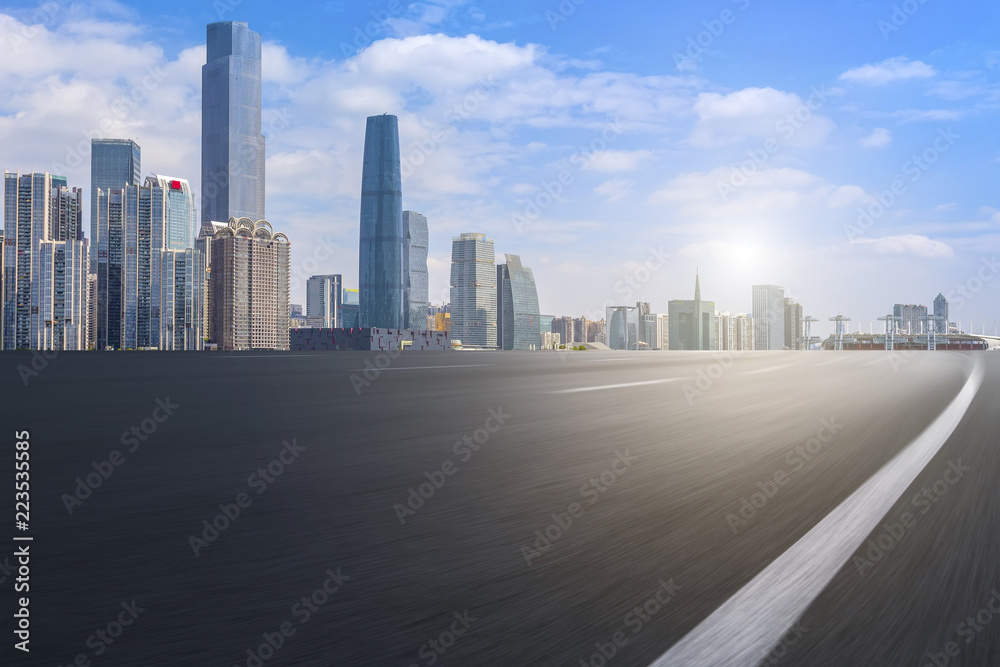 Road pavement and Guangzhou city buildings skyline