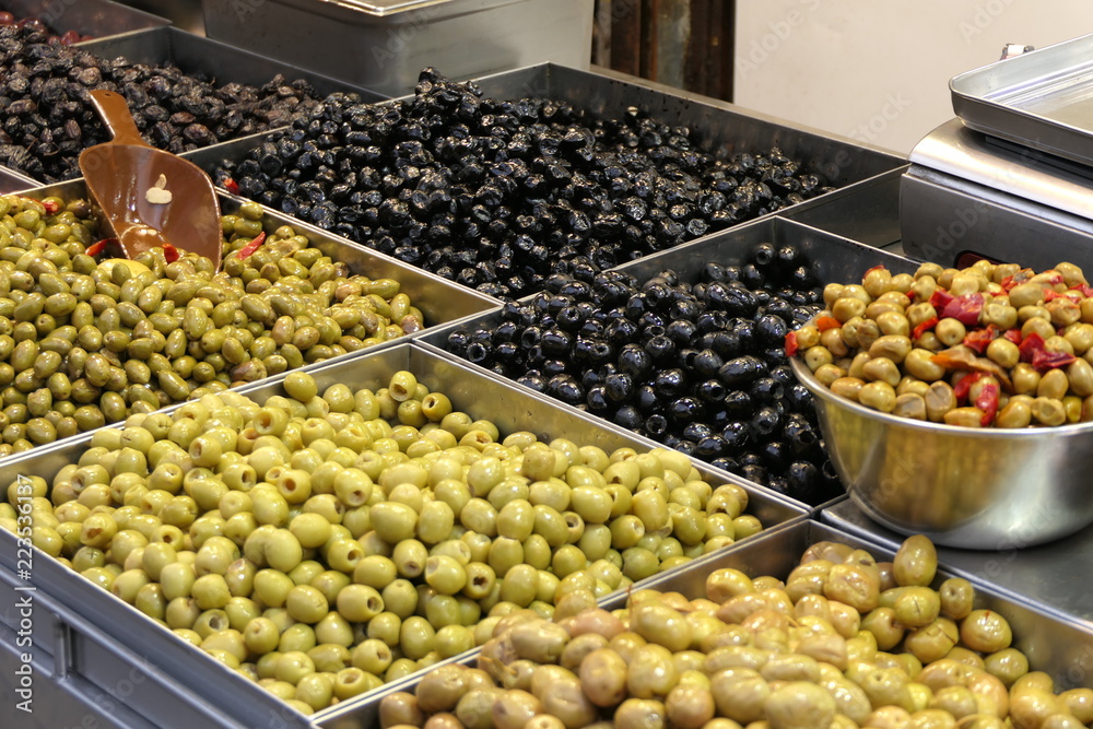 Market stall with a mix of fresh olives Market stall with a mix of fresh olives