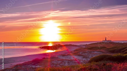 sunset timelapse of larino beach on the coast of galicia, spain photo