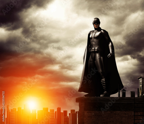 Dark Superhero on rooftop overlooking cityscape photo