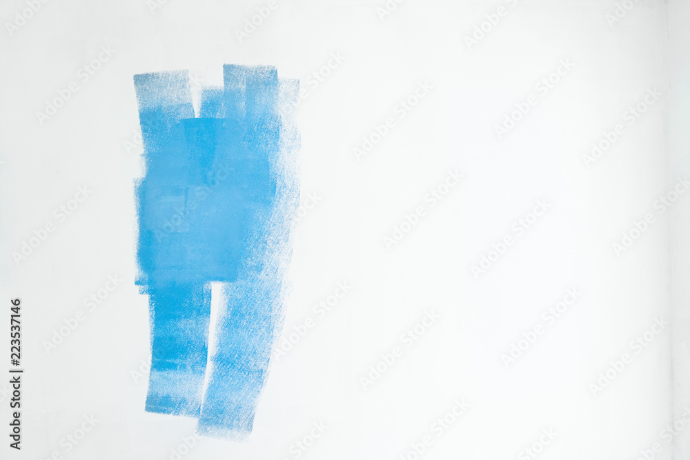 Fototapeta premium House renovation background of white wall with blue paint stains
