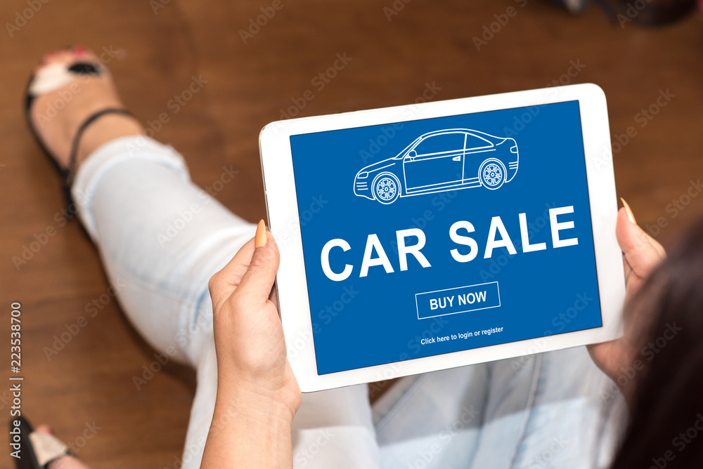 Car sale concept on a tablet Car sale concept on a tablet