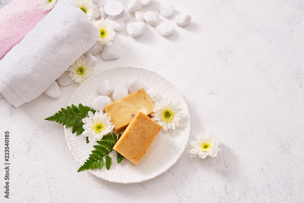 close up of body care cosmetic products on stone table close up of body care cosmetic products on stone table