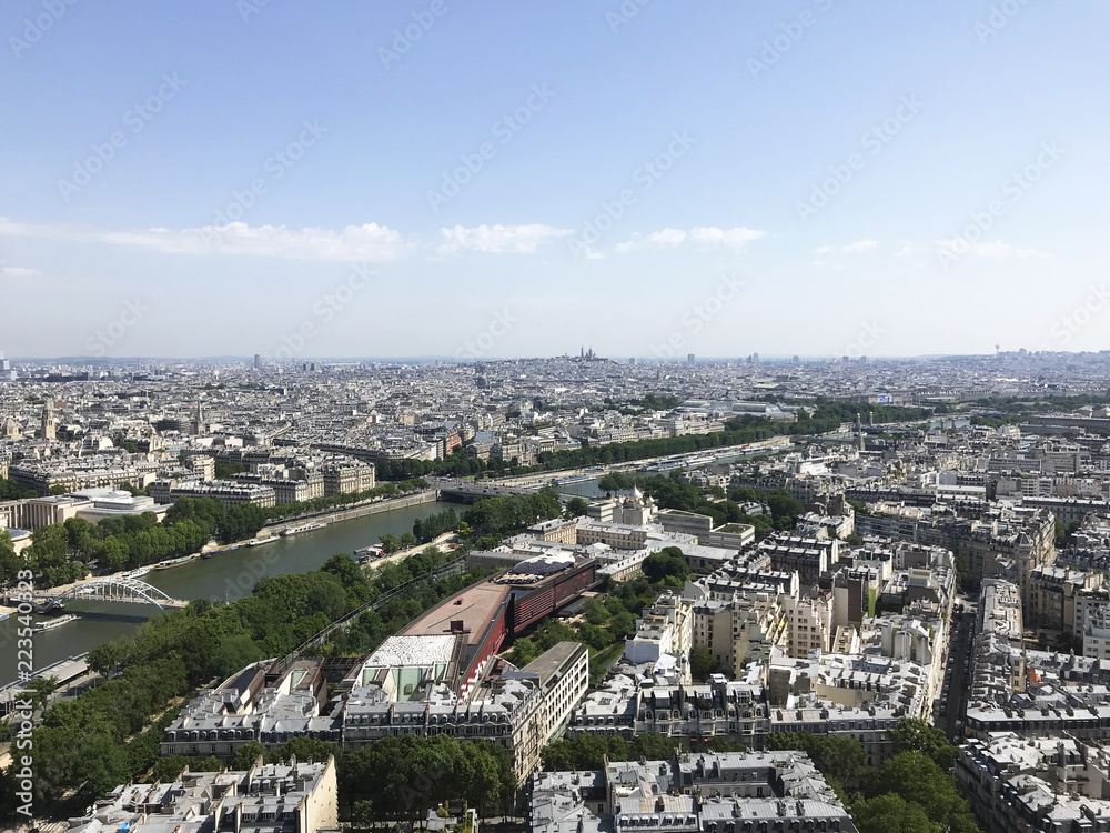 View Paris town, the Seine river and its banks, UNESCO world patrimony, the top of the Eiffel Tower, France