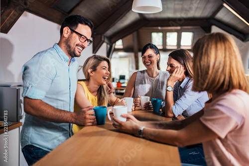 Laughing at coffee break.