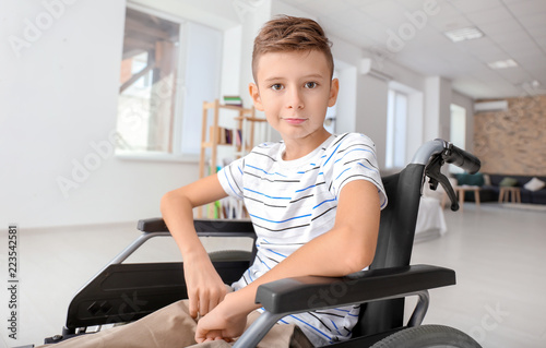 Handicapped boy in wheelcha...