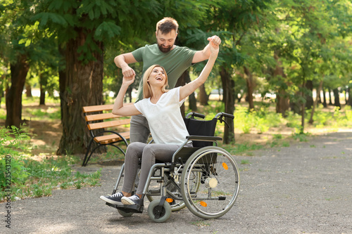 Beautiful woman in wheelcha...