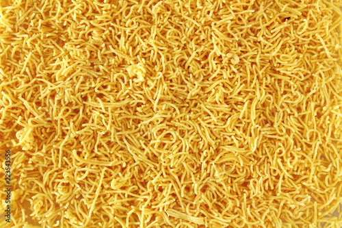 traditional indian gujrati tea time snack food namkeen sev or vermicelli fry noodles of chickpea flour or besan